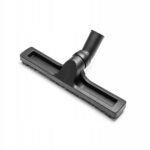 Czarna ssawka do odkurzacza, idealna do skutecznego czyszczenia podłóg, z otworem do montażu na rurze.