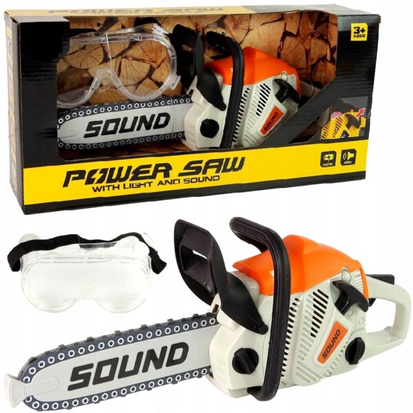 Zabawka piła mechaniczna z dźwiękiem i światłem w pudełku, z dołączonymi okularami ochronnymi dla dzieci od 3 lat.