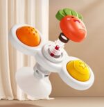 Kolorowa zabawka sensoryczna dla dzieci z trzema przyciskami: marchewką, gwiazdą i pomarańczowym kołem.